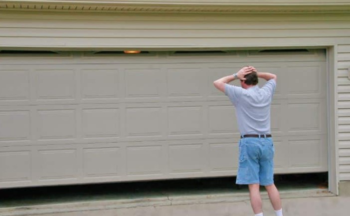 can dents in garage doors be repaired
